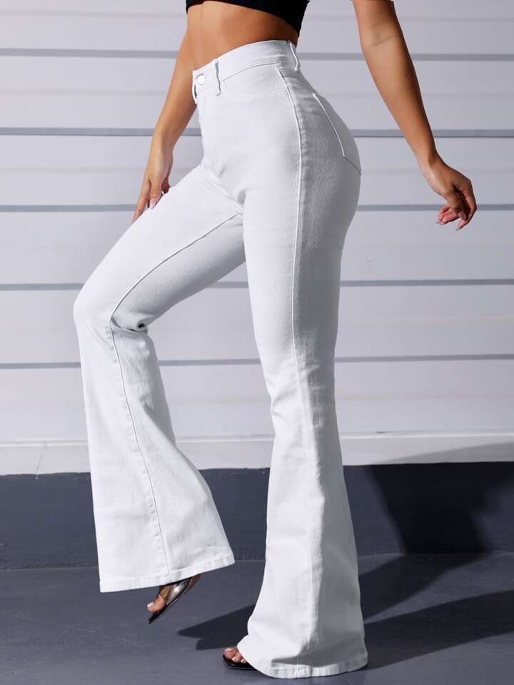 Fashionable white boot cut jeans